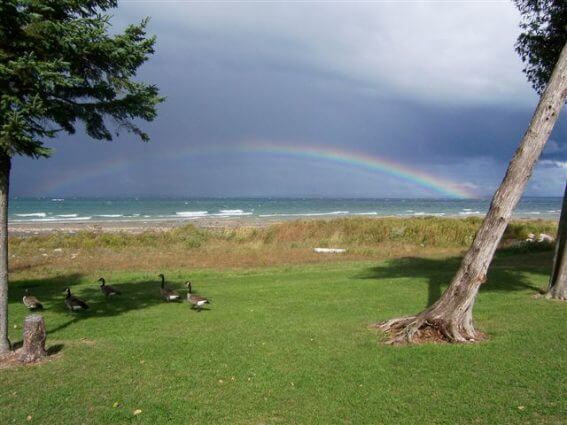 Photo of rainbow over Lake Huron by Linda Aukerman at Mackinaw Mill Creek Camping in Mackinaw City, MI.