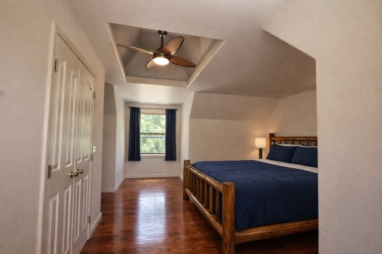 King size bedroom of Huron House Rental by Mackinaw Mill Creek Camping in Mackinaw City, MI