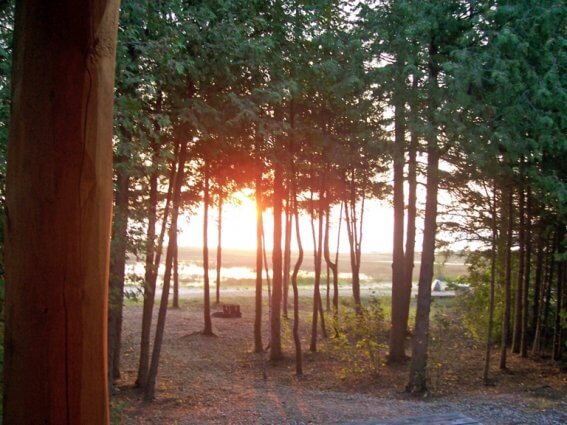 Photo of an October sunrise by Jude Ann Bailod at Mackinaw Mill Creek Camping in Mackinaw City, MI.