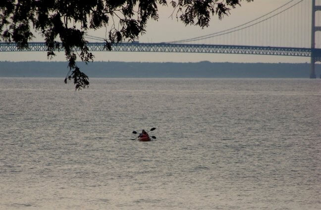 Photo of campers kayaking along the shores of Lake Huron at Mackinaw Mill Creek Camping in Mackinaw City, MI. © 2016 Frank Rogala.