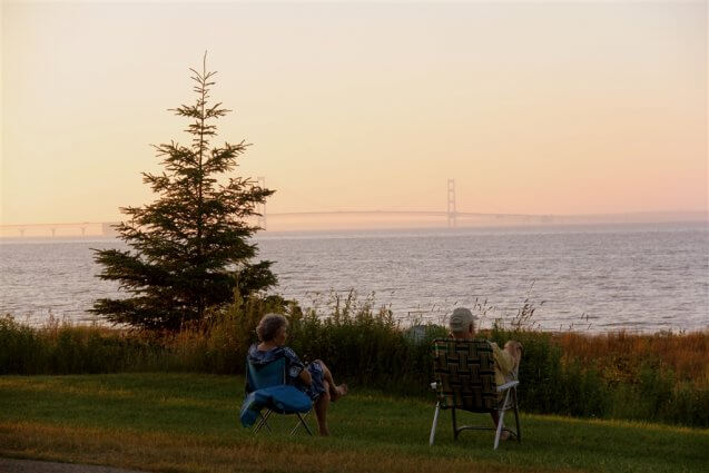 Photo of camper viewing the Mackinac Bridge from Mackinaw Mill Creek Camping in Mackinaw City, MI. © 2016 Frank Rogala.