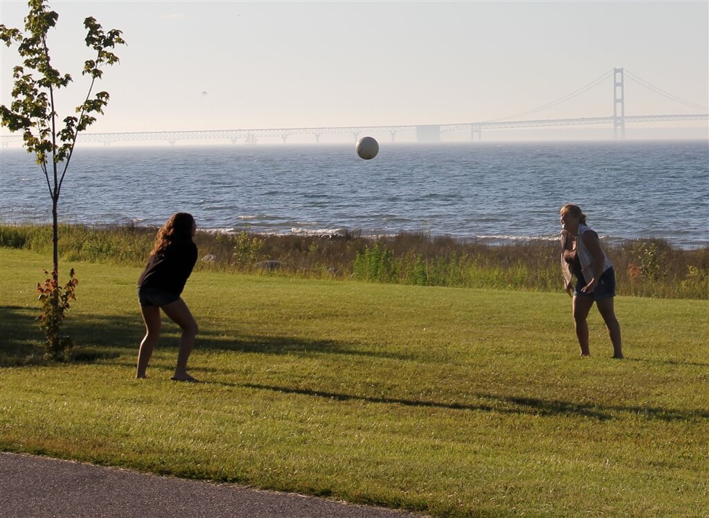 Photo of campers playing volleyball at Mackinaw Mill Creek Camping in Mackinaw City, MI. © 2016 Frank Rogala.