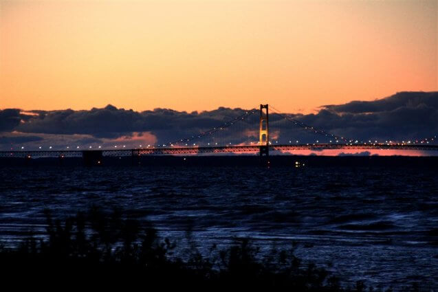 Photo of the Mackinac Bridge lit up at sunset from Mackinaw Mill Creek Camping in Mackinaw City, MI. © 2016 Frank Rogala.