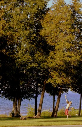 Photo of camper catching a fly ball at Mackinaw Mill Creek Camping in Mackinaw City, MI. © 2016 Frank Rogala.