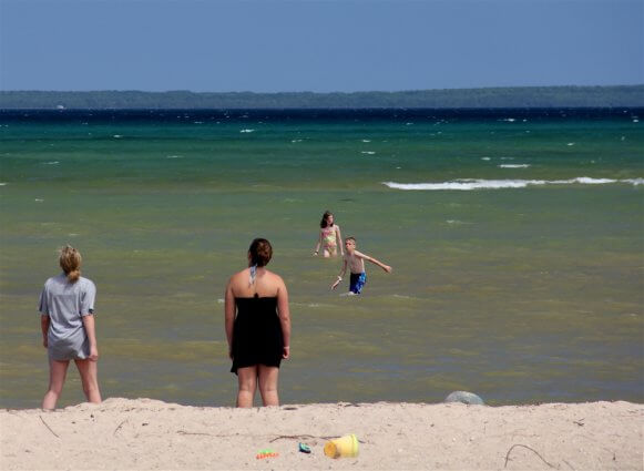 Photo of campers swimming at the beach of Mackinaw Mill Creek Camping in Mackinaw City, MI. © 2016 Frank Rogala.