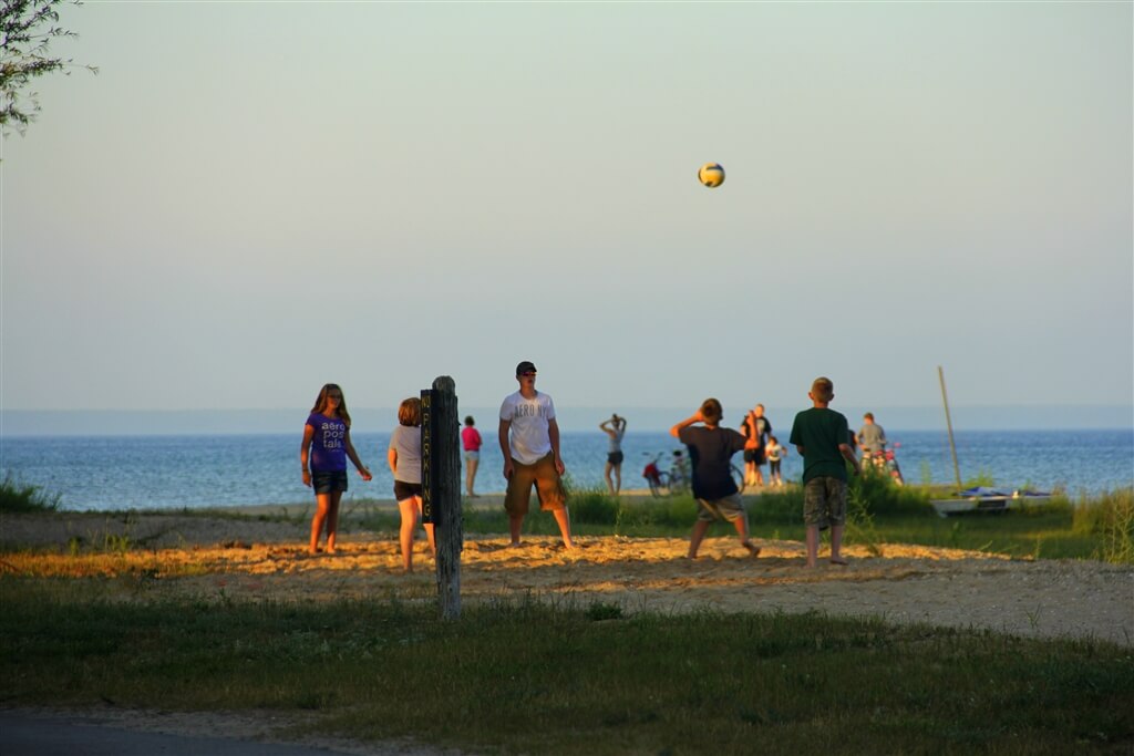 Photo of people playing volleyball at Mackinaw Mill Creek Camping in Mackinaw City, MI. © 2016 Frank Rogala.