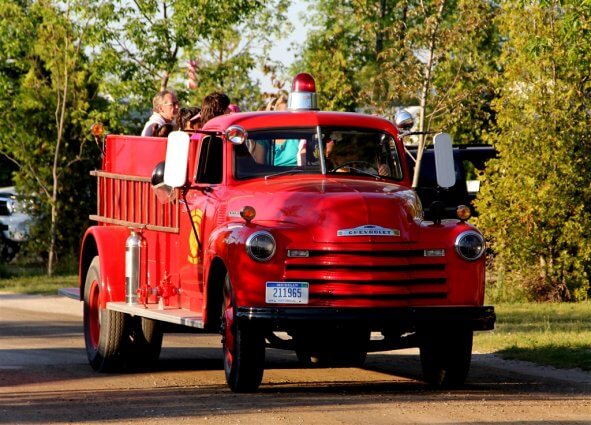 Photo of a 1940s era fire truck, offering free rides at Mackinaw Mill Creek Camping in Mackinaw City, MI. © 2016 Frank Rogala.