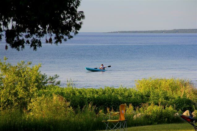 Photo of a camper kayaking at Mackinaw Mill Creek Camping in Mackinaw City, MI. © 2016 Frank Rogala.