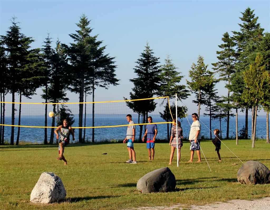 Photo of campers playing volleyball at Mackinaw Mill Creek Camping in Mackinaw City, MI. © 2016 Frank Rogala.