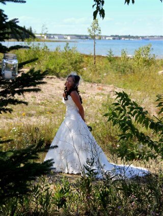 Photo of the bride of a wedding on the Straits of Mackinac at Mackinaw Mill Creek Camping in Mackinaw City, MI. © 2016 Frank Rogala.