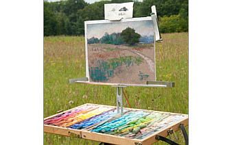 Photo from the Mackinaw City Paint Out. Image source: mackinawcityareaartscouncil.org.