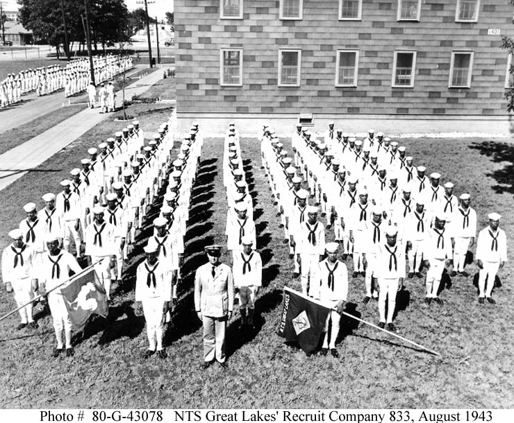 Photo #: 80-G-43078. Naval Training Station, Great Lakes, Illinois Company 833, made up of African-American recruits, in formation on 20 August 1943. Official U.S. Navy Photograph. Image source: history.navy.mil.